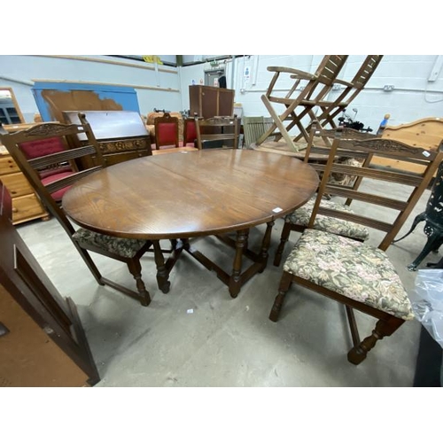 115 - Old Charm oak drop leaf table 75H 152W 114D and 4 ladder back chairs