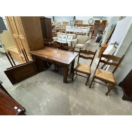 131 - Solid oak farmhouse extending table 75H 222W 76D and 4 chairs