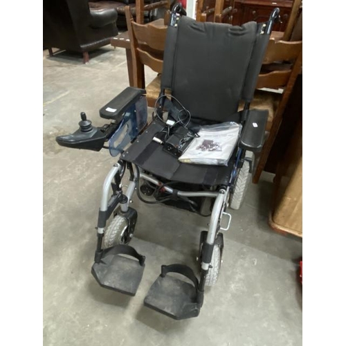 133 - Rascal Powerchair P200 with charger and manual