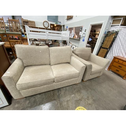 163 - Oatmeal upholstered sofa bed 165W and a similar chair 105W