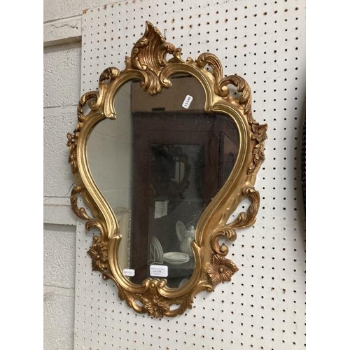 393 - Ornate gilt framed mirror 44x62cm