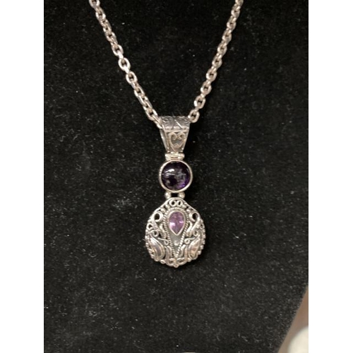 394 - Heavy silver chain with Amethyst cabochon pendant , 24 inches