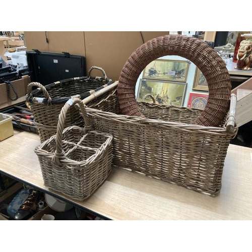 410 - Wicker bottle holder, 2 wicker log baskets & wicker framed mirror 58cm diameter