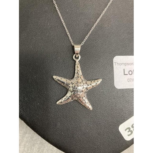 424 - Silver Starfish pendant on silver chain, 40cm long