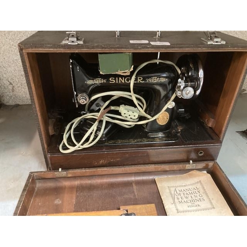 473 - Cased Singer EE169942 electric sewing machine with foot pedal and manual