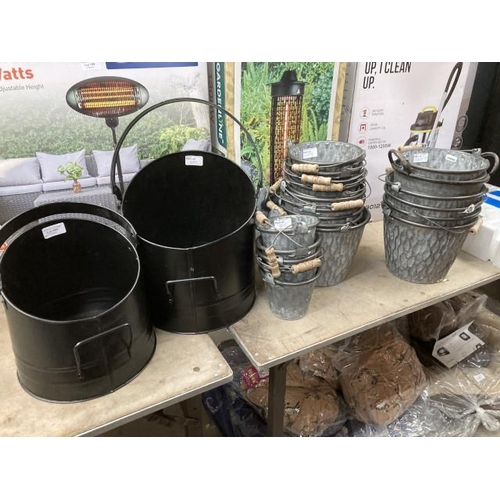 489 - Metal planters in various sizes and 2 metal reproduction coal scuttles (new)