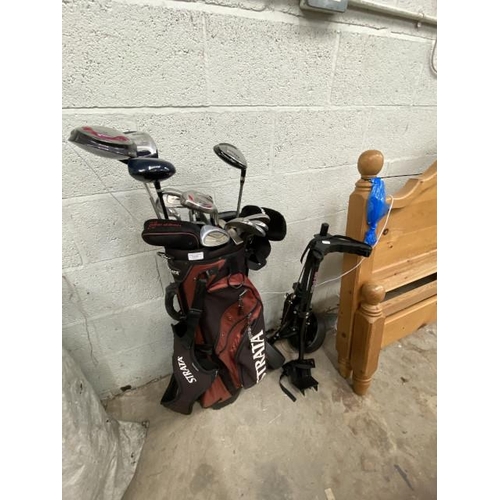 97 - STRATA golf bag with assorted clubs including Yonex & Wilson and a Masters MT-P130 golf trolley