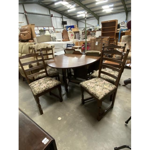 32 - Old Charm oak drop leaf table 75H 152W 114D and 4 ladder back chairs