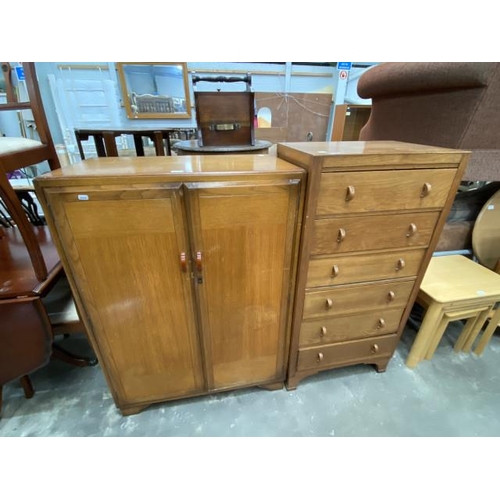 103 - 1950's oak tall boy with shelves and hanging rail to the interior 116H 84W 46D and a Herbert E Gibbs... 