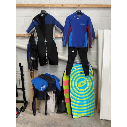 14 - 3 body boards, 2 Osprey wetsuits (no size), Ion (men's size 52/L) wetsuit top, Zone3 wetsuit (no siz... 