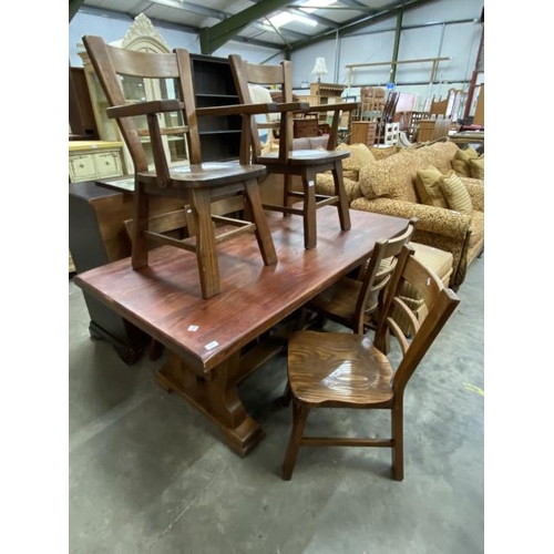 168 - Solid oak dining table 75H 175W 90D and 6 chairs including 2 carvers