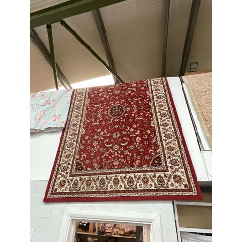 188 - Red ground rug 226 x 160cm