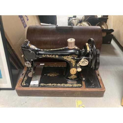 449 - Cased Singer sewing machine Y5736083