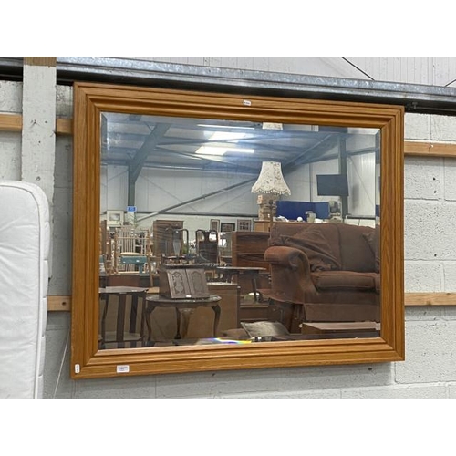 7 - Oak framed bevel edge mirror 118 x 92cm