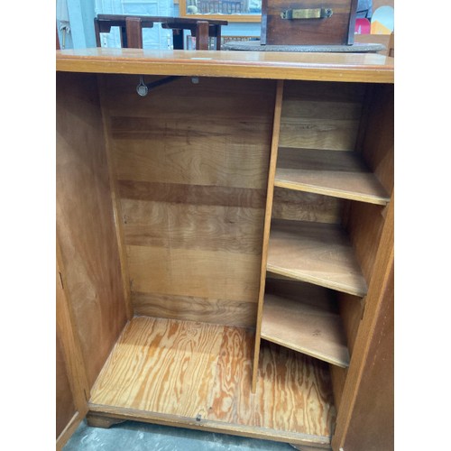 103 - 1950's oak tall boy with shelves and hanging rail to the interior 116H 84W 46D and a Herbert E Gibbs... 