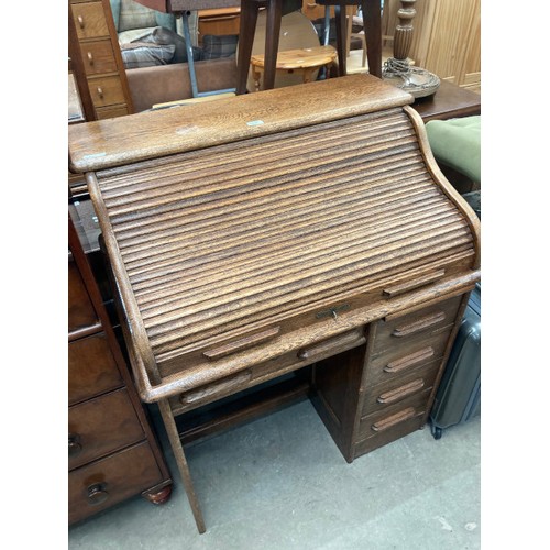 124 - Antique oak roll top desk 110H 90W 64D