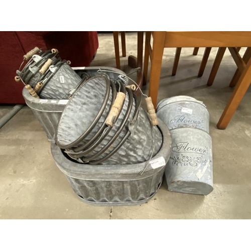 108 - Assorted galvanised planters - in various sizes