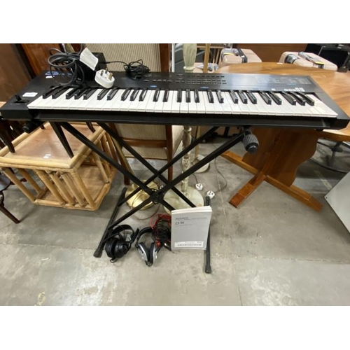 121 - Roland D-5 multi timbral linear synthesiser with power lead and stand, Studiospares 448740 headphone... 