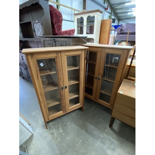 18 - 2 pine glazed bookcases 112H 70W 21D