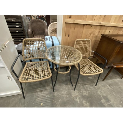 184 - Rattan garden table 70H 60cm diameter and 2 chairs (new)