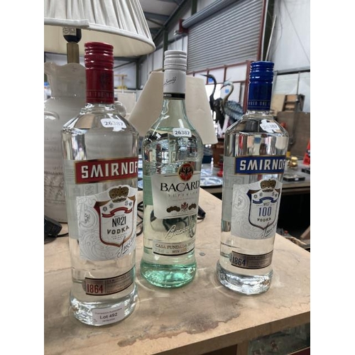 492 - 2 bottles of Smirnoff vodka No. 21 & 100 1L each & Bacardi rum 100cl