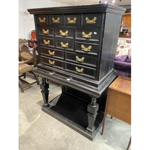 89 - 18th century and later ebonised and oak-lined cabinet on stand with 14 drawers 153H 106W 98D