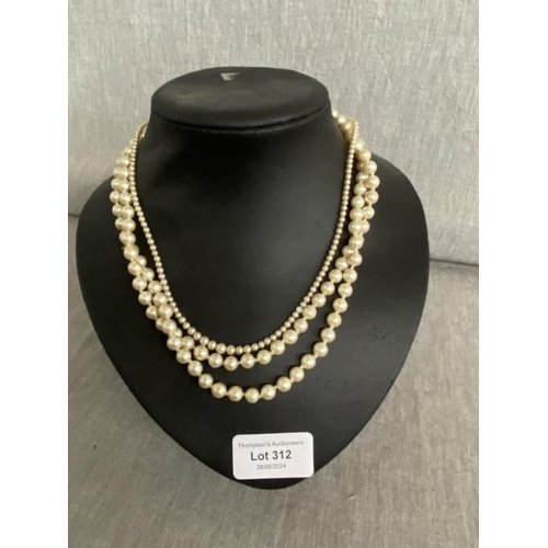 300 - One double strand of simulated pearls with 9ct gold clasp & a single strand of simulated pearls with... 