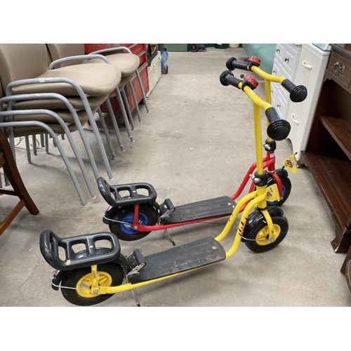 128 - 2 'PUKY' R 03 scooters in red and yellow