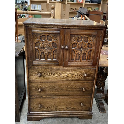 204 - Good quality carved oak cupboard on chest 115H 78W 47D