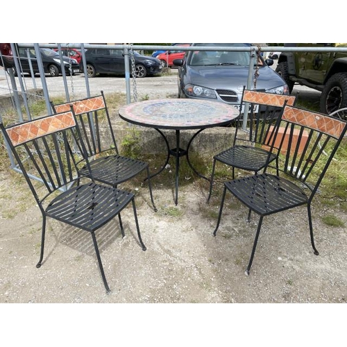 229 - Tiled top garden table 76H 101W 101D and 4 chairs