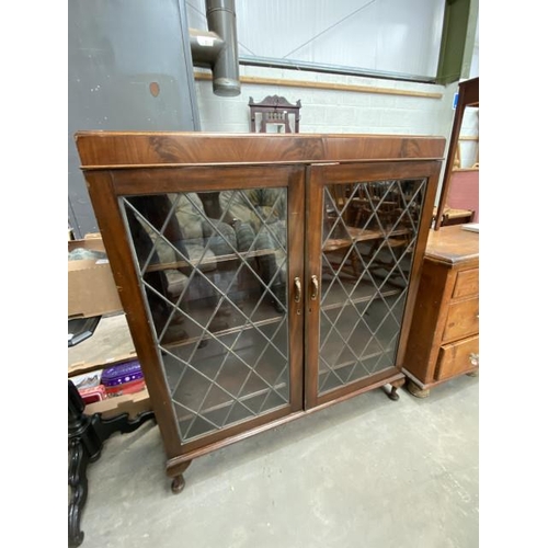 24 - Mahogany leaded glazed 2 door bookcase 125H 108W 33D