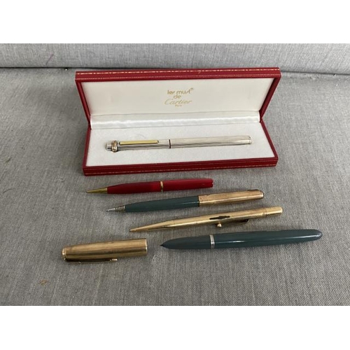 295 - Pens inc. cased Les Must De Cartier Paris 925 silver cased ballpoint pen with booklet, Parker 1/10 1... 