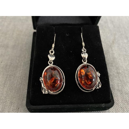 322 - Pair of silver & amber earrings