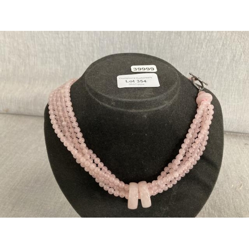 354 - Pink jade multi strand bead necklace with silver clasp, 45cm long