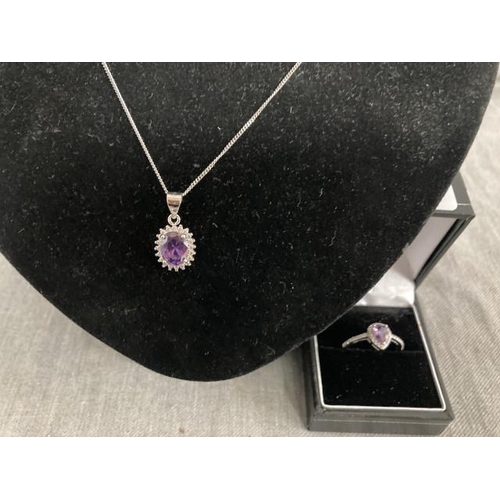 359 - 925 Silver necklace with faux purple sapphire pendant, chain 46cm long & matching silver ring, size ... 