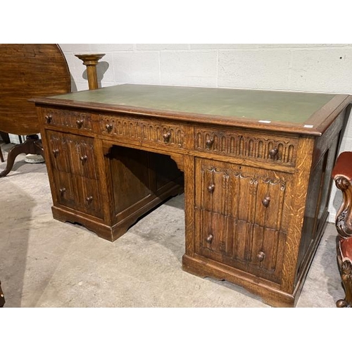 72 - Edwardian carved oak pedestal desk with green leather inset 77H 153W 83D (splits into 3 sections for... 