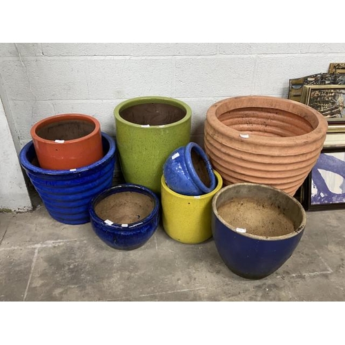 11 - 7 glazed planters in various sizes and one plastic planter