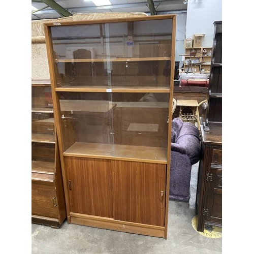 115 - Herbert E Gibbs teak glazed bookcase 175H 91W 28D