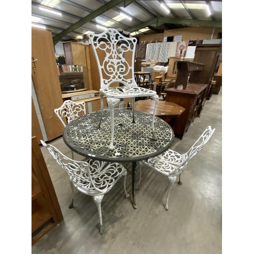 50 - Aluminium garden table 74H 120cm diameter and 4 chairs (will require re painting)