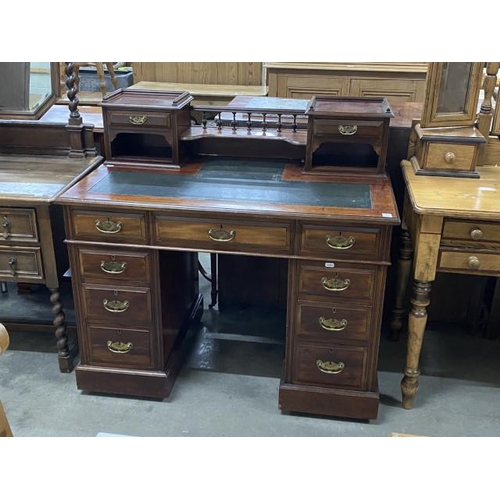 55 - Antique mahogany ‘Dickens’ desk with black leather inset 100H 107W 63D