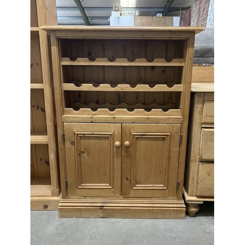 59 - Pine wine rack with 2 door cupboard to underneath 114H 84W 33D