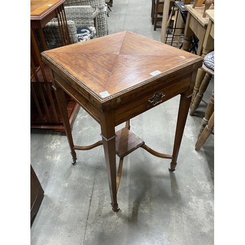 68 - Edwardian mahogany fold over ‘Envelope’ card table 74H 48W 48D