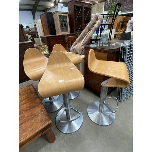 122 - 4 curved plywood and chrome barstools 38W