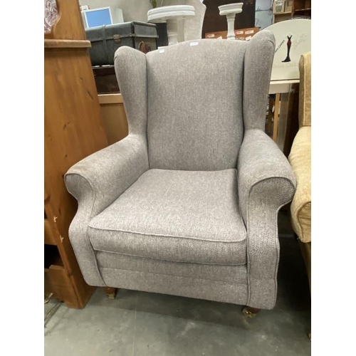 128 - Grey herringbone upholstered wing armchair 80W