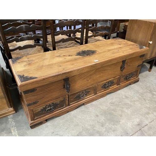 133 - Pine, iron bound trunk with 4 drawers 50H 149W 49D