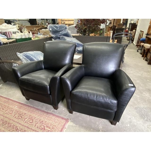 218 - 2 black faux leather armchairs 85W (new)