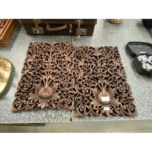 283 - Two ornate carved wall panels 29x45cm