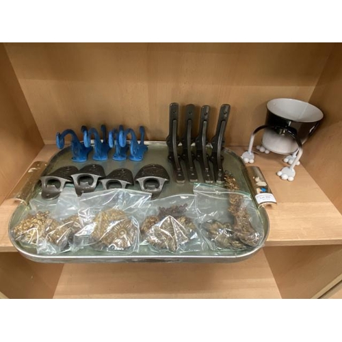 292 - Tray of metal wares including 4 cast brackets, 4 blue cast coat hooks, 4 cast advertising bottle ope... 