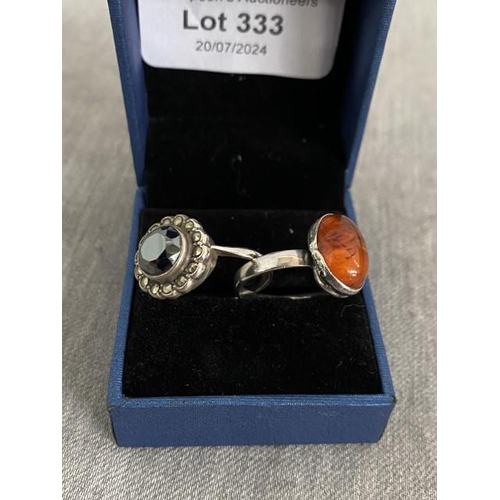 333 - Silver & amber ring (size O 1/2) & silver & hematite ring (size U)