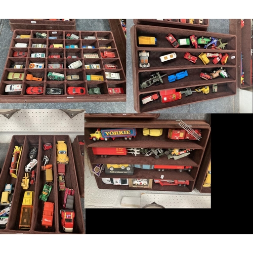 386 - 4 display trays of play worn vehicles inc. Matchbox, Lledo, Corgi Juniors, Cubs, Dinky Toys, Yestery... 